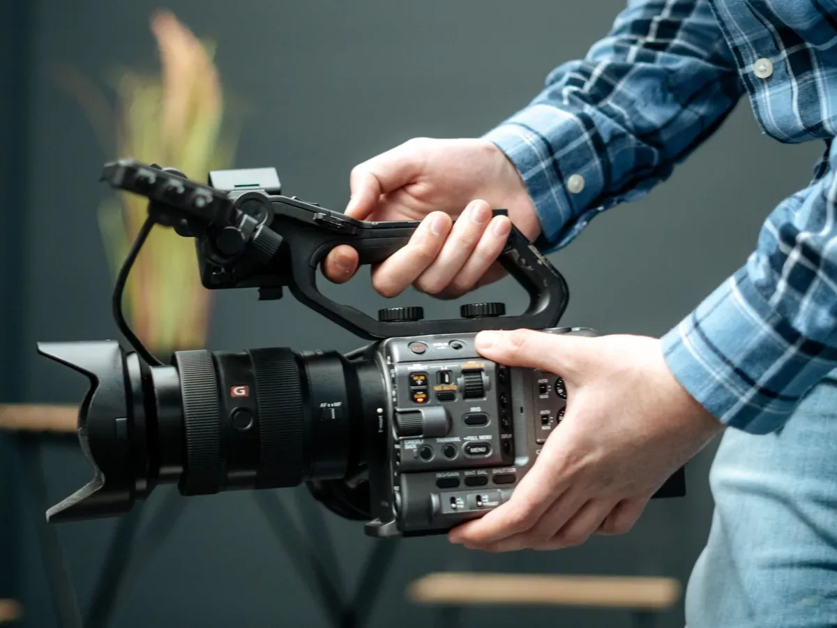 A professional cinema camera being prepared on location.